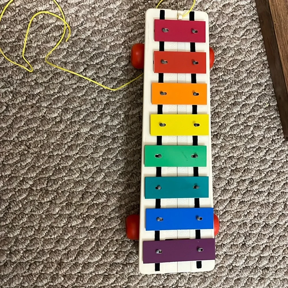 Fisher-Price Rainbow Xylophone Toy with Red Wheels